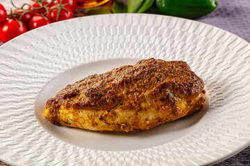 Baked chicken breast with spices and herbs
