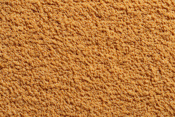 this photograph captures smooth uniform background featuring rich velvet texture illuminated by soft diffused light