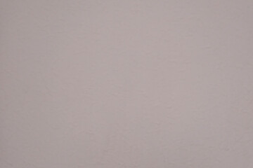 ざらざらの古い汚い壁のテクスチャー背景壁紙　凸凹の質感　傷ついた表面と張り付けたテープのあとの汚れ　アンティーク・ビンテージ