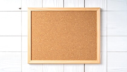 Fototapeta premium Cork board with wooden frame on white wall