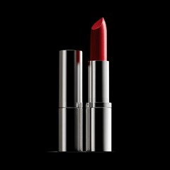 Obraz premium Red lipstick in metallic silver casing, isolated on black background