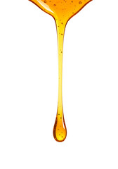 honey dripping from a spoon