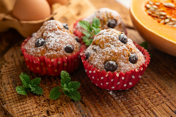 Pumpkin Chocolate Chip Muffins. A traditional fall recipe with fresh pumpkin, eggs, and flour.