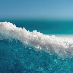 Fototapeta premium Close-up of a snow-covered ice edge, vibrant turquoise blue ice beneath