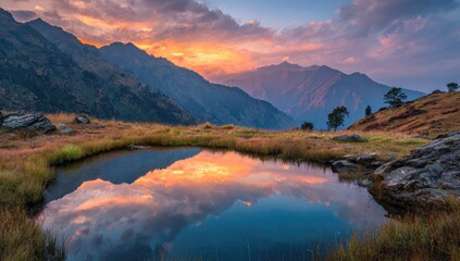 Mountain pool mirroring sunset
