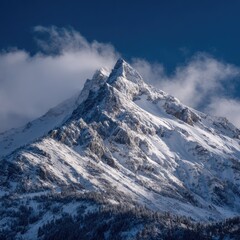 Snowy mountain peak piercing a vibrant blue sky (1)