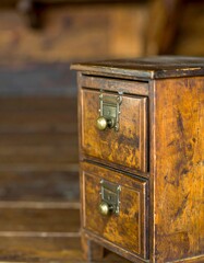 Small wooden cabinet with two drawers