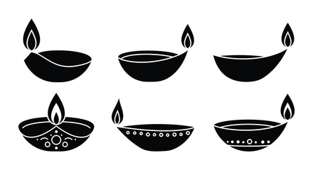 Traditional indian diya lamps in various designs and patterns