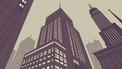 Low angle view of city skyscrapers with illuminated windows against a cloudy sky at dusk or dawn