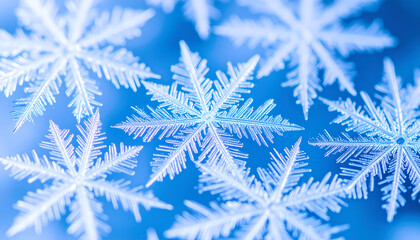 Beautiful macro of snowflake crystal in winter. Cold blue background of frozen snow and ice. intricate, delicate pattern creates sense of serene natural wonder