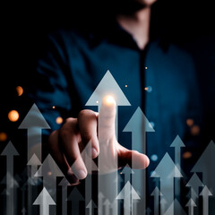 Pointing Finger Activating Growth Arrows Symbolizing Business Success and Positive Trends in Dark Corporate Setting