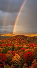 Fototapeta premium Dramatic double rainbow over a colorful autumn forest