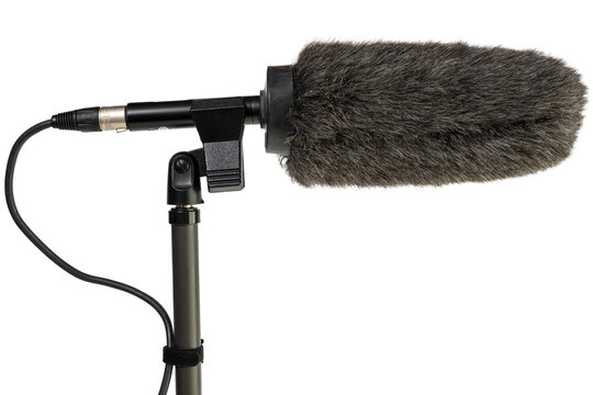 Professional shotgun microphone with windscreen cut out for capturing high quality audio on a boom stand