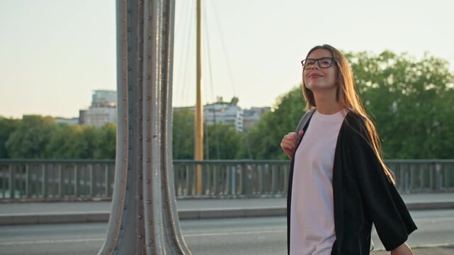 Tourist walking near Bir Hakeim bridge in the capital of France Paris. Beautiful architecture travel and tourism in Europe.