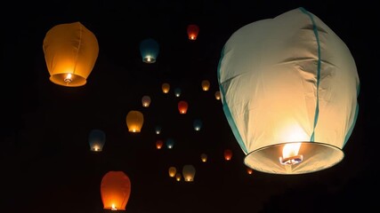 Illuminated sky lanterns at night, for celebrations and festivals