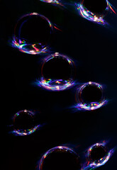 abstract colored bubbles in neon plasma light