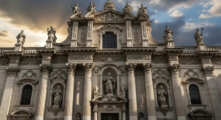 Obraz premium Ornate facade of a baroque church with statues and columns under a dramatic sky in europe travel