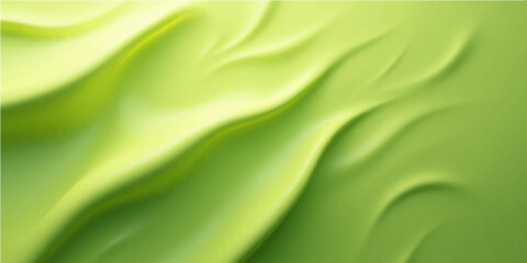 Soft flowing green satin silk fabric with a smooth textile texture and liquid waves pattern