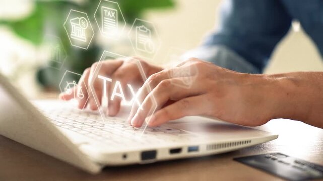Tax concept - female hands tyling on laptop with tax overlay