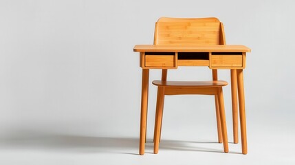 Compact bamboo desk with hidden compartments, paired with a simple chair in a small workspace