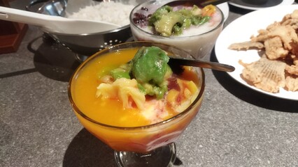 Delicious Tropical Mango Avocado Dessert with Crispy Fried Snacks Delightful Culinary Experience