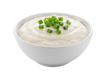 Creamy white sauce with green onions in a bowl