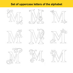 Collection of nine ornate uppercase letter M designs with intricate decorative swirls and filigree alphabet
