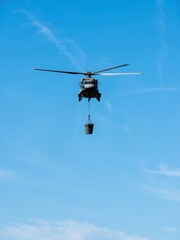 Helicopter water drop operation aerial view emergency response clear sky action scene