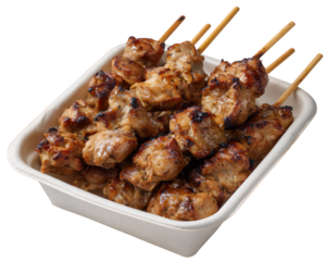 Grilled chicken skewers in white takeaway box, juicy and smoky, perfect for street food lovers and quick meals, ideal for lunch or dinner on go