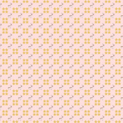 Repeating pattern featuring golden star-like shapes and wavy lines on a soft pink background.