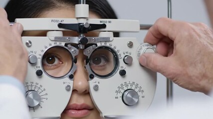 Close Up of Woman Undergoing Eye Exam Using Phoropter in Bright White Environment - Powered by Adobe