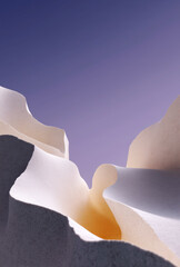 Minimal abstract paper sculpture with layered curves inspired by canyon landscapes and soft light