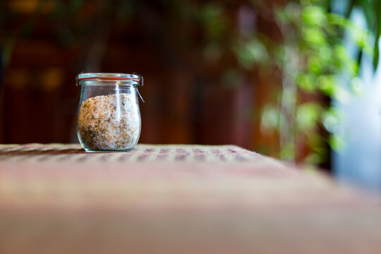 Jar of artisanal salt on table