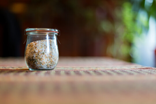 Jar of homemade garlic and herb infused salt