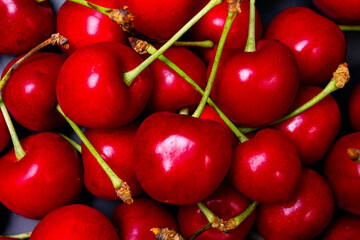 lots of cherries on a black background