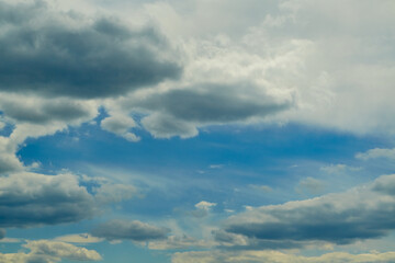 The clouds form a circle - natural geometry. A symbol of infinity and cycles. An excellent visual for themes of astronomy, nature, and meditation.