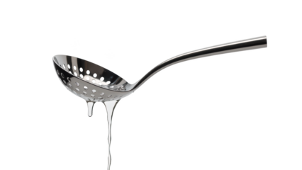 Shiny stainless steel slotted spoon drips liquid, showcasing its functional design and modern aesthetic. Perfect for cooking and serving