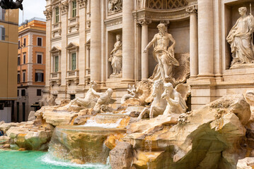 Trevi Fountain statues and turquoise water in Rome, Italy, symbol of baroque architecture