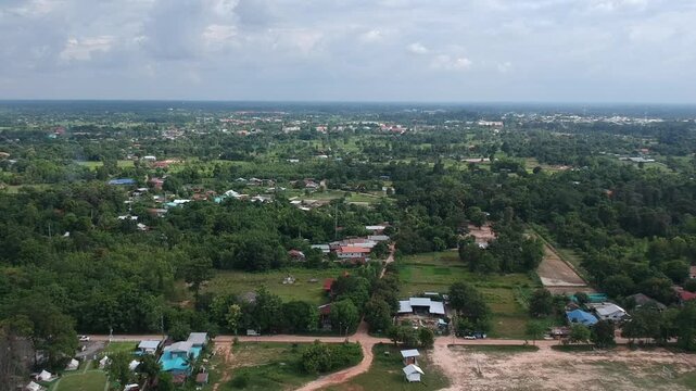 Aerial Drone View of Phutthachai Reservoir at Buddhist Park, Amnat Charoen, Thailand, Perfect for travel, tourism, cultural, and documentary projects.