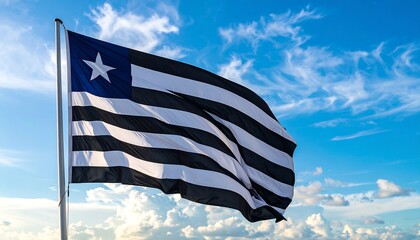 Black and White Striped Flag of Rio Grande do Sul Against a Clear Sky