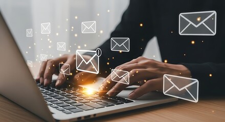 Woman using a laptop for email communication marketing and online messaging concept