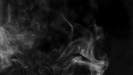 Detail Shot of Atmospheric Smoke Slowly Floating on Black Background