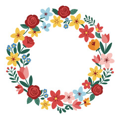 A colorful floral wreath with roses, tulips, and other flowers and foliage.