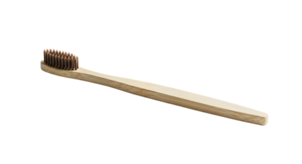 Bamboo toothbrush with brown bristles for dental hygiene and oral care, isolated on transparent background