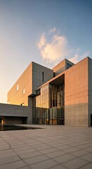 Minimalist concrete & glass art museum, serene architectural photo.