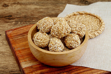 Bowl of sweets made with sesame seeds and jaggery