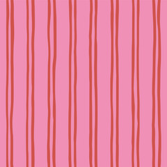 Seamless striped playful pattern with vertical red wavy lines on pink background. Hand drawn geometric abstract design for textile, wallpaper, wrapping paper, cover