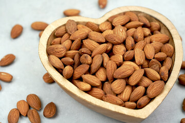 Almonds help lower cholesterol in the body and nourish the heart