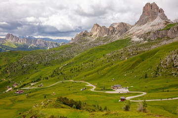 Winding Road and a Few Houses in a Green Valley