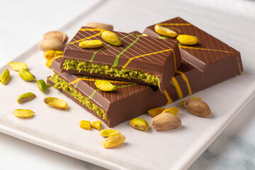 Trendy chocolate; Dubai chocolate is made with pistachio paste and kadayif.